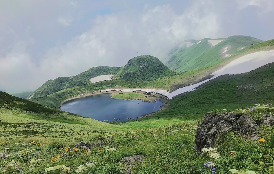 A photograph of Mount Chokai with its abundant nature